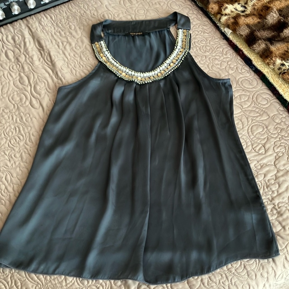 Woman’s Sleeveless Top with Embellishhments